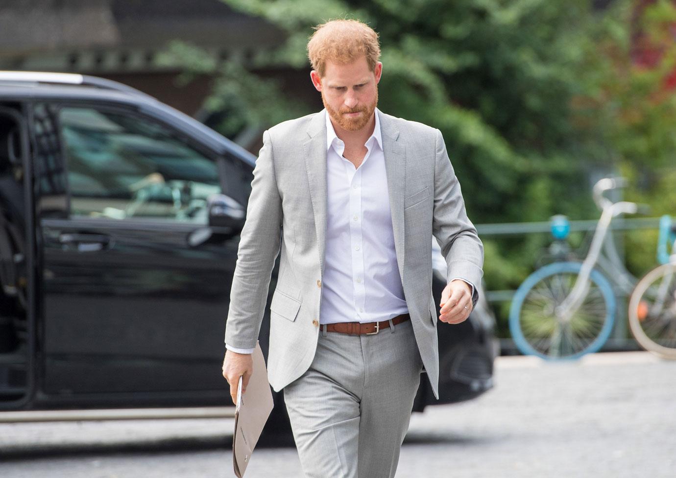 queen elizabeth ii prince harry no military titles tro