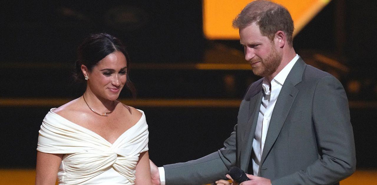 prince harry leans meghan markle support