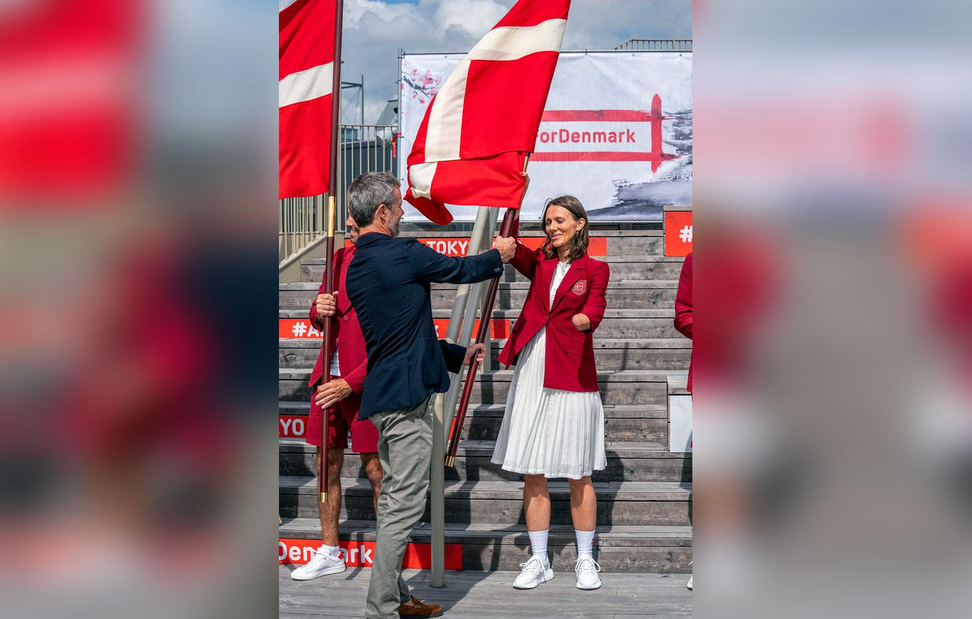 crown prince frederik of denmark hands out danish olympic flag