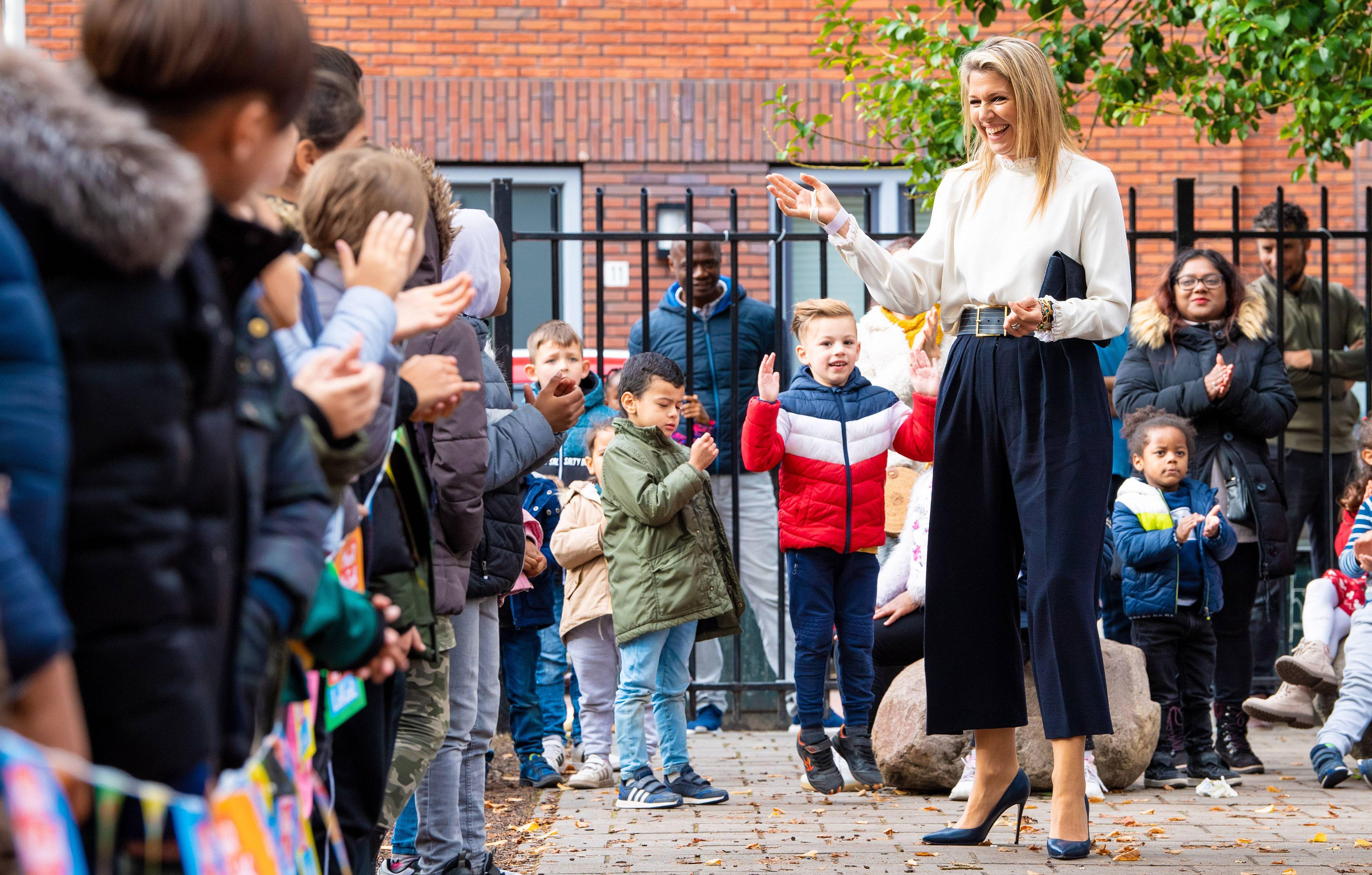 queen maxima visits queen beatrix school in netherlands