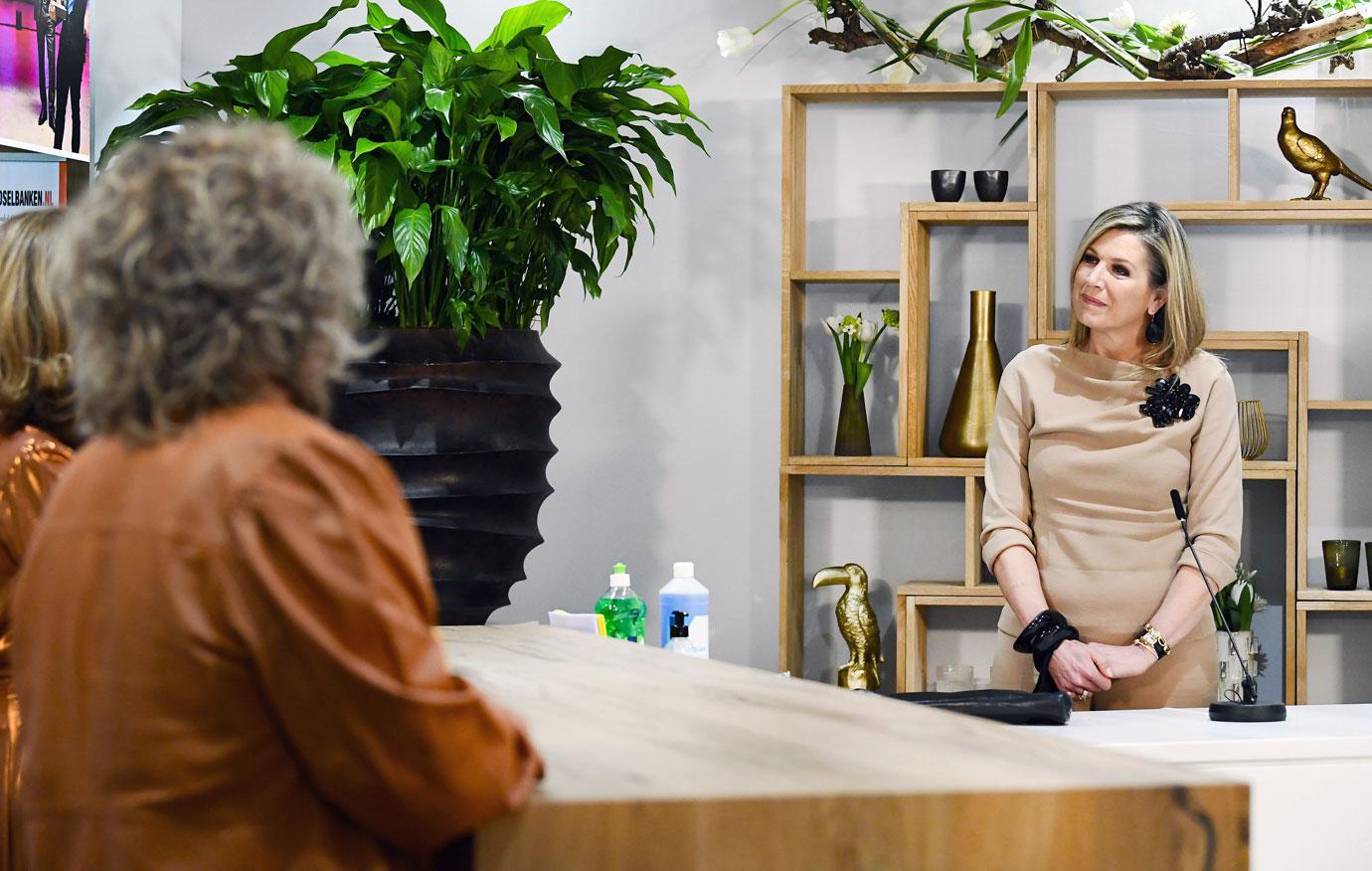 queen maxima of the netherlands visits a cleaning company