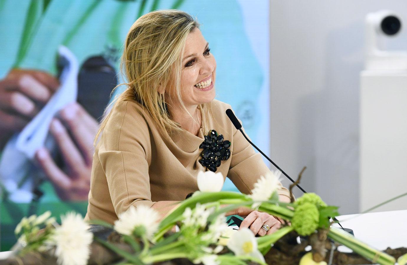 queen maxima of the netherlands visits a cleaning company