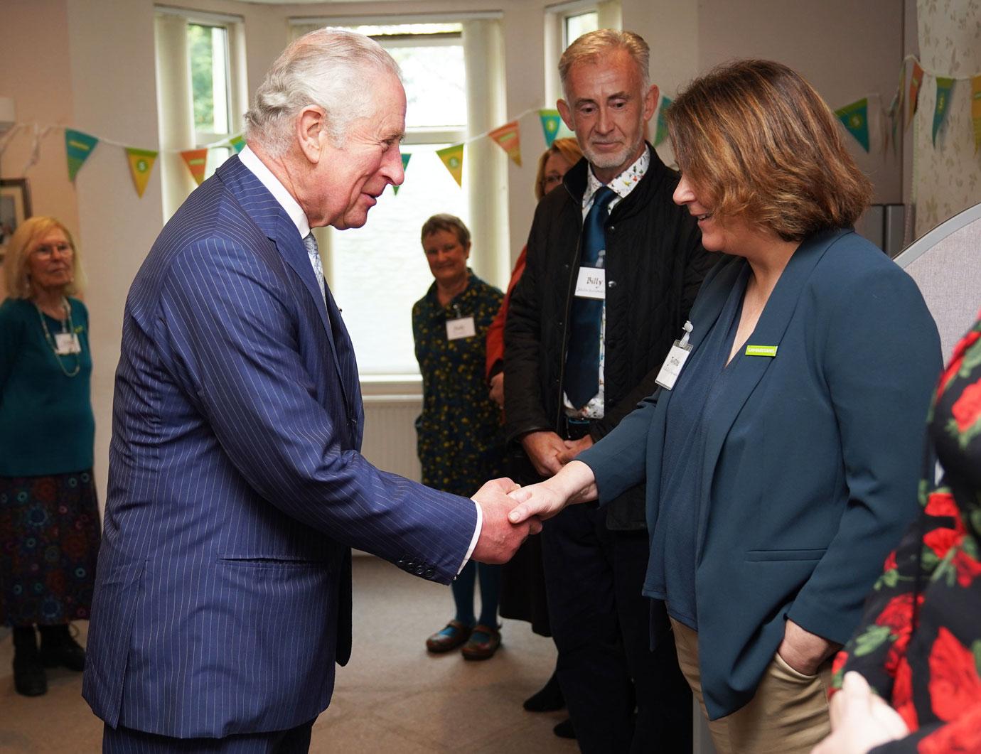 prince charles visits the gloucester and district samaritans