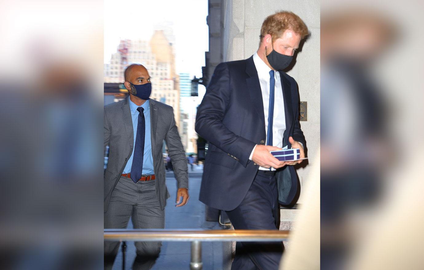 prince harry seen in and out the intercontinental hotel new york city