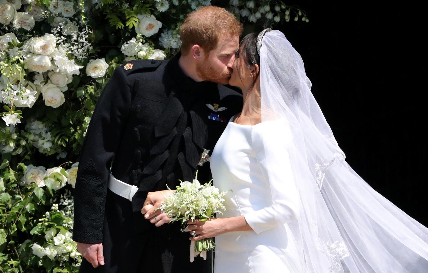 prince harry meghan markles body language at wedding