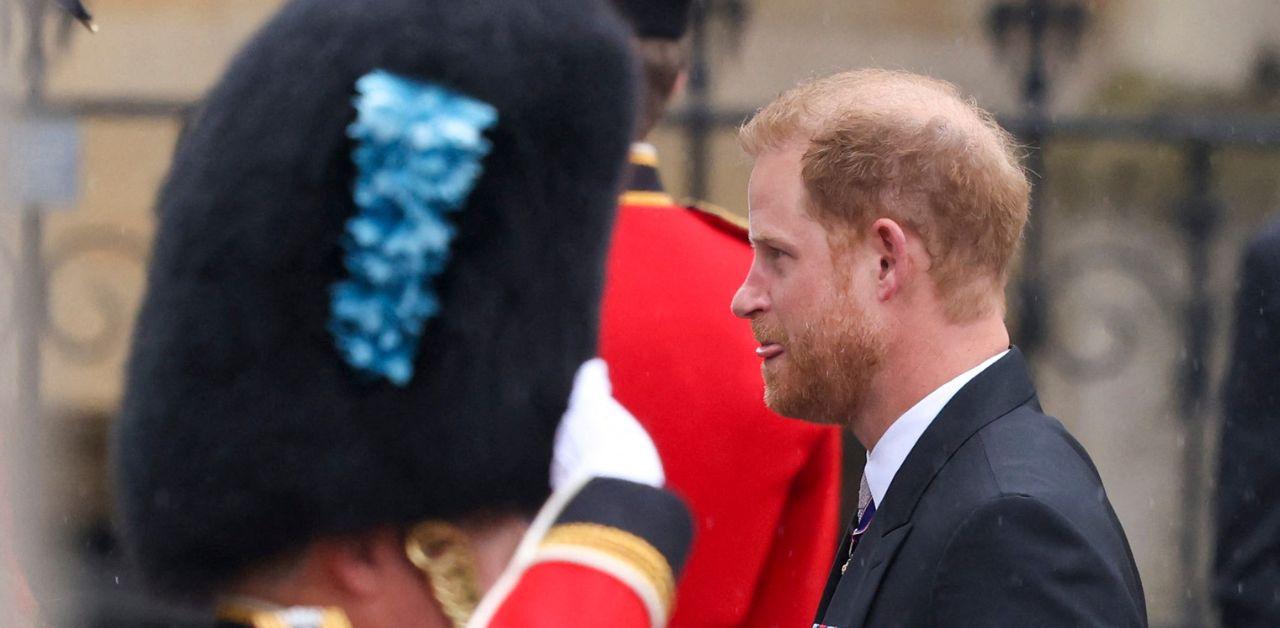 prince harry visits buckingham palace