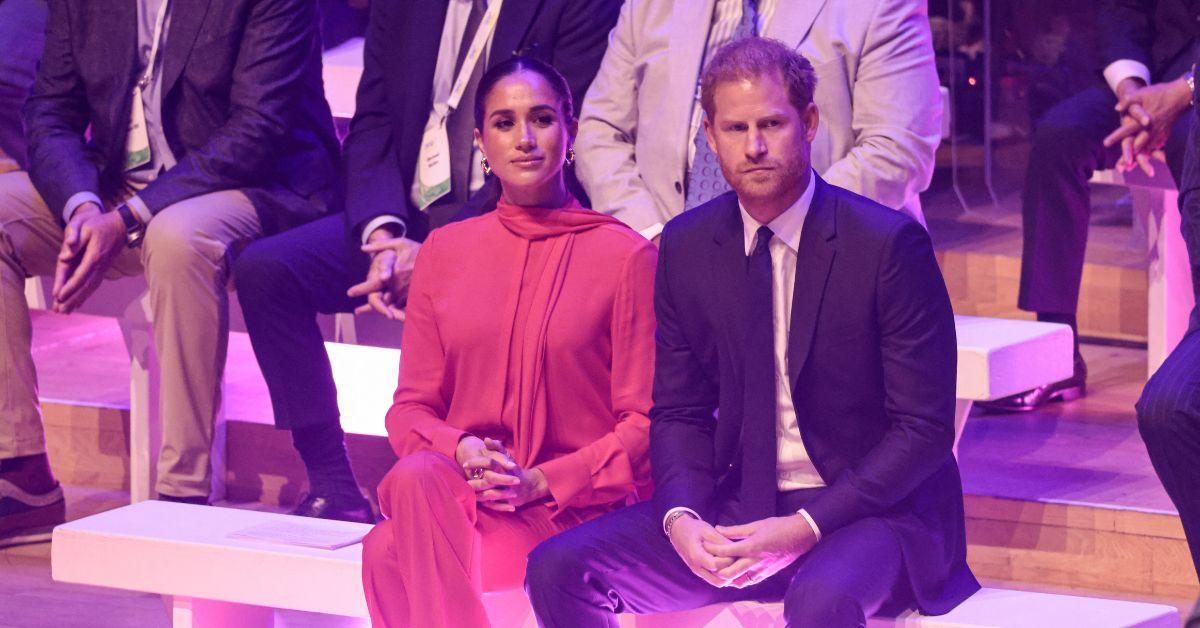 meghan markle and prince harry looking stern