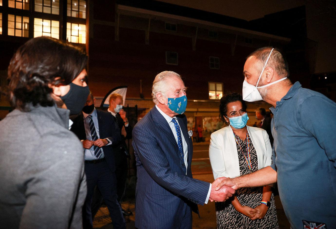 prince charles visits a covid  vaccination centre