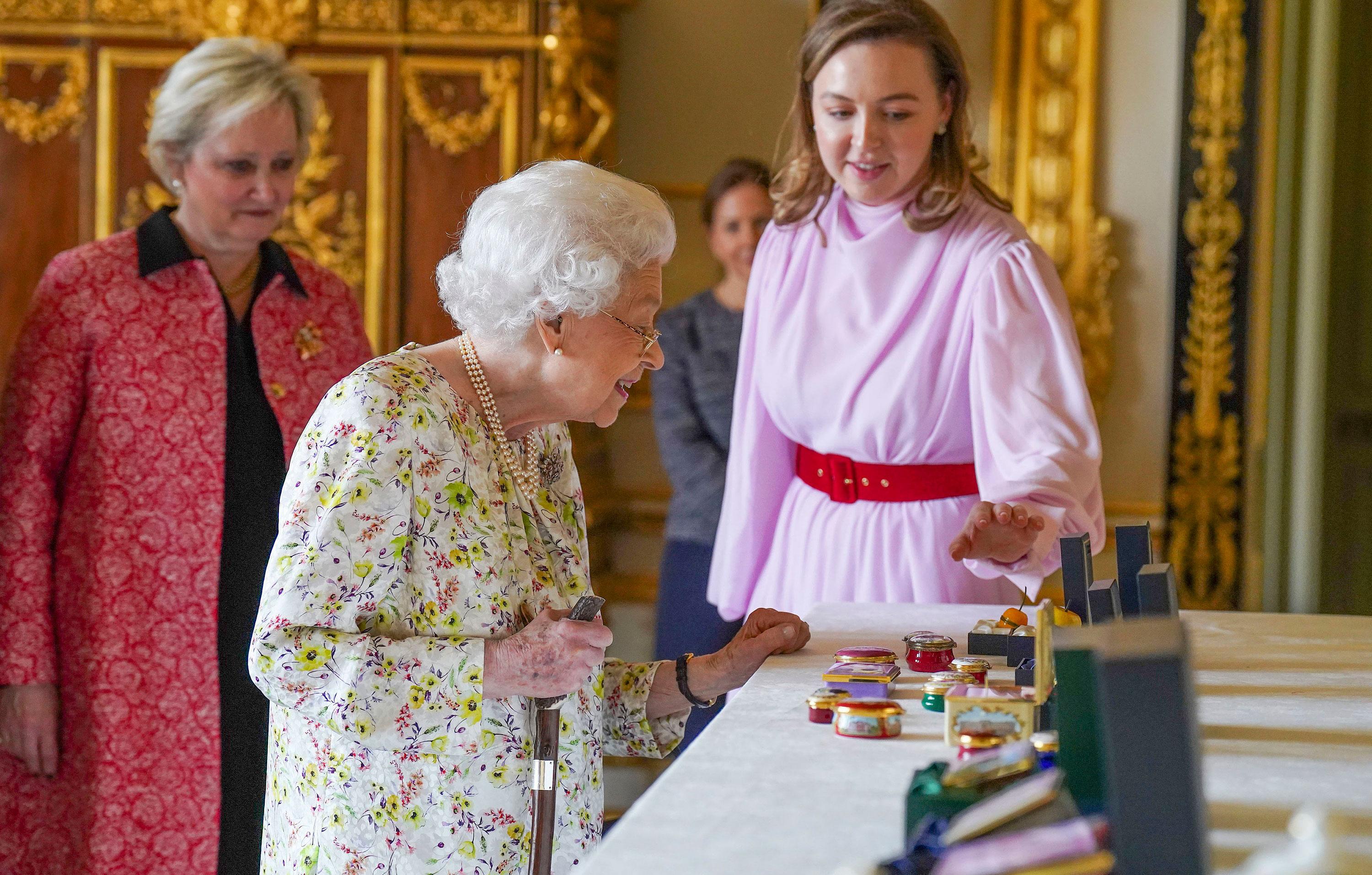 the queen views a display from halcyon days