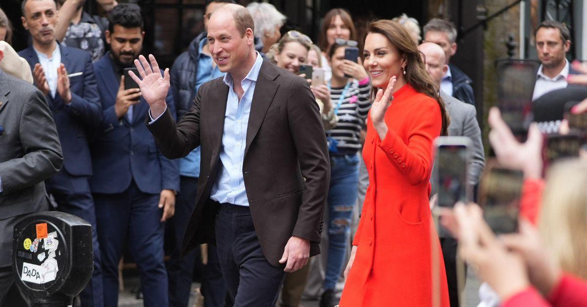 kate middleton and prince william waving to crowds