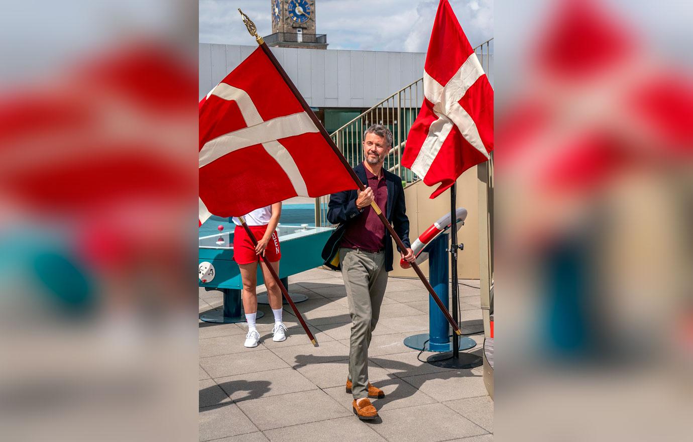 crown prince frederik of denmark hands out danish olympic flag