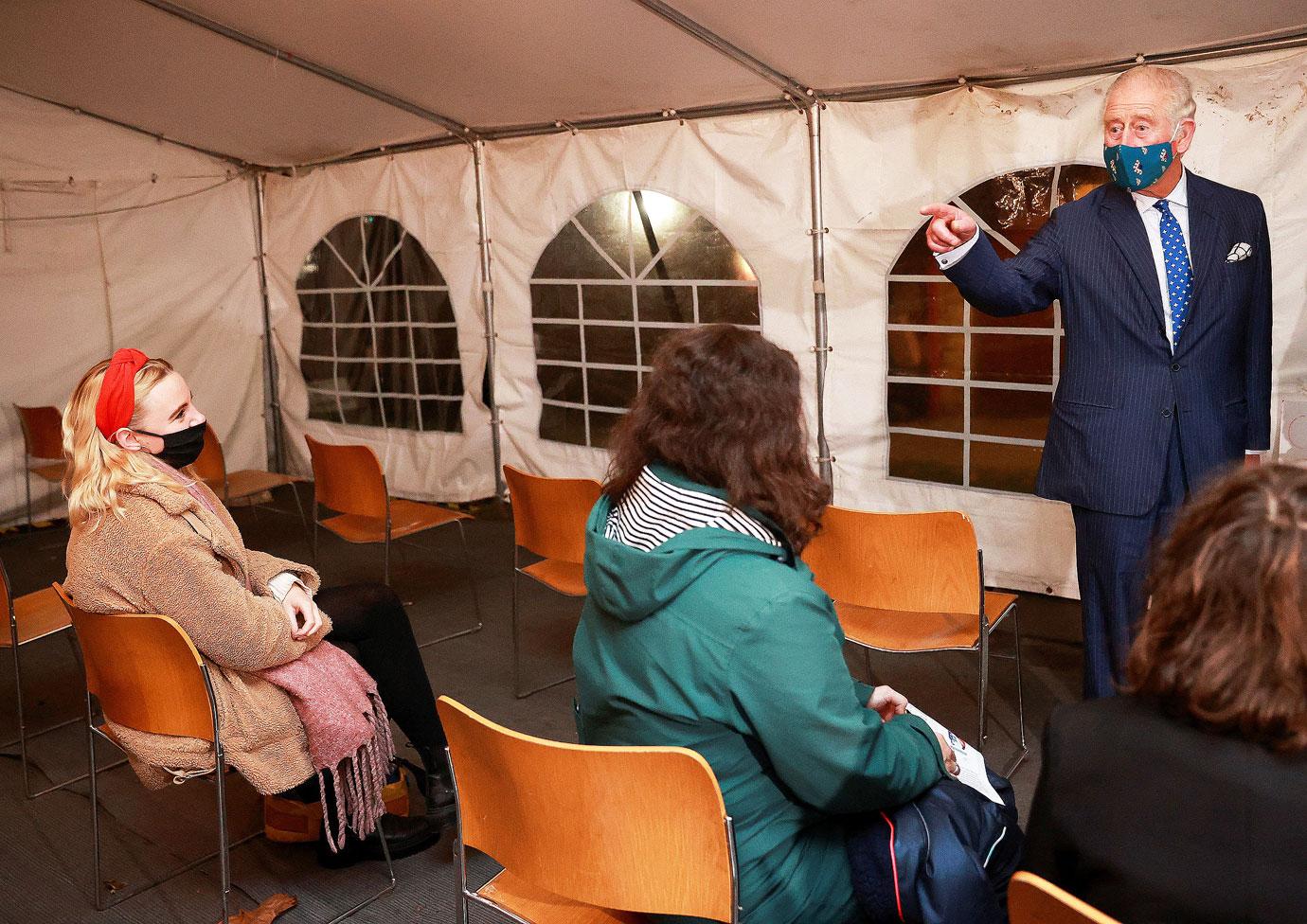 prince charles visits a covid  vaccination centre