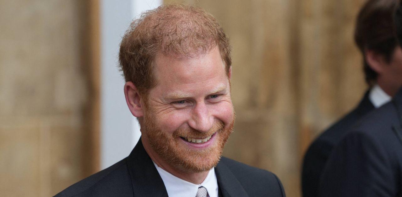 prince harry visits buckingham palace