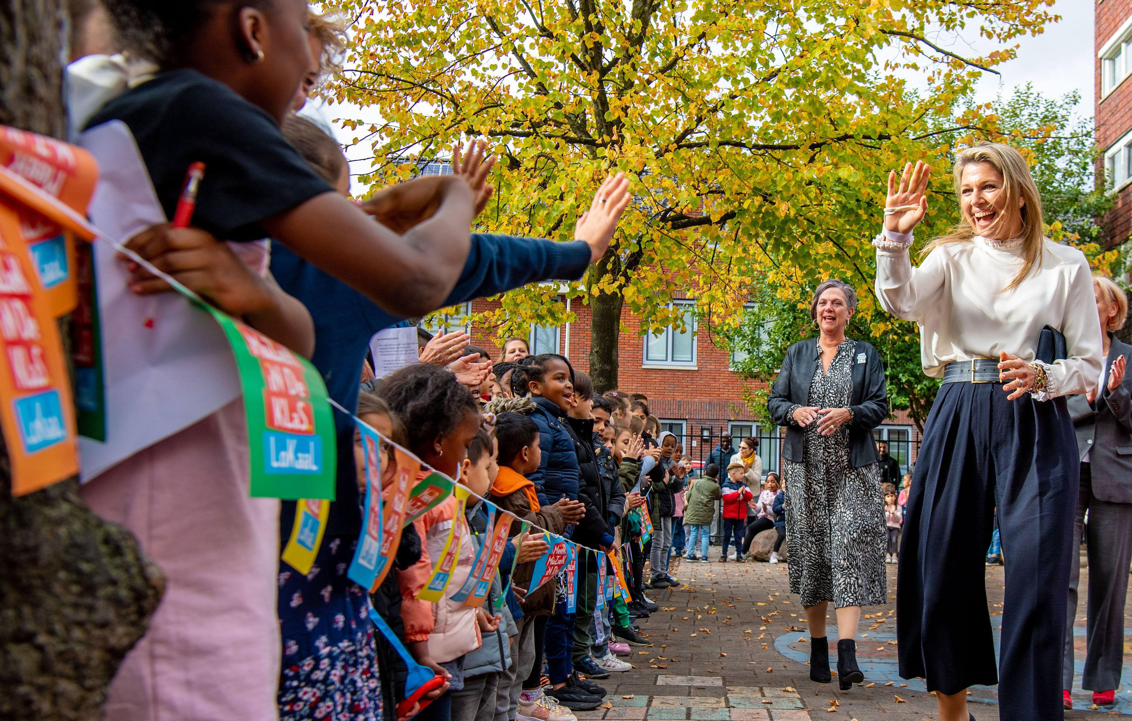 queen maxima visits queen beatrix school in netherlands