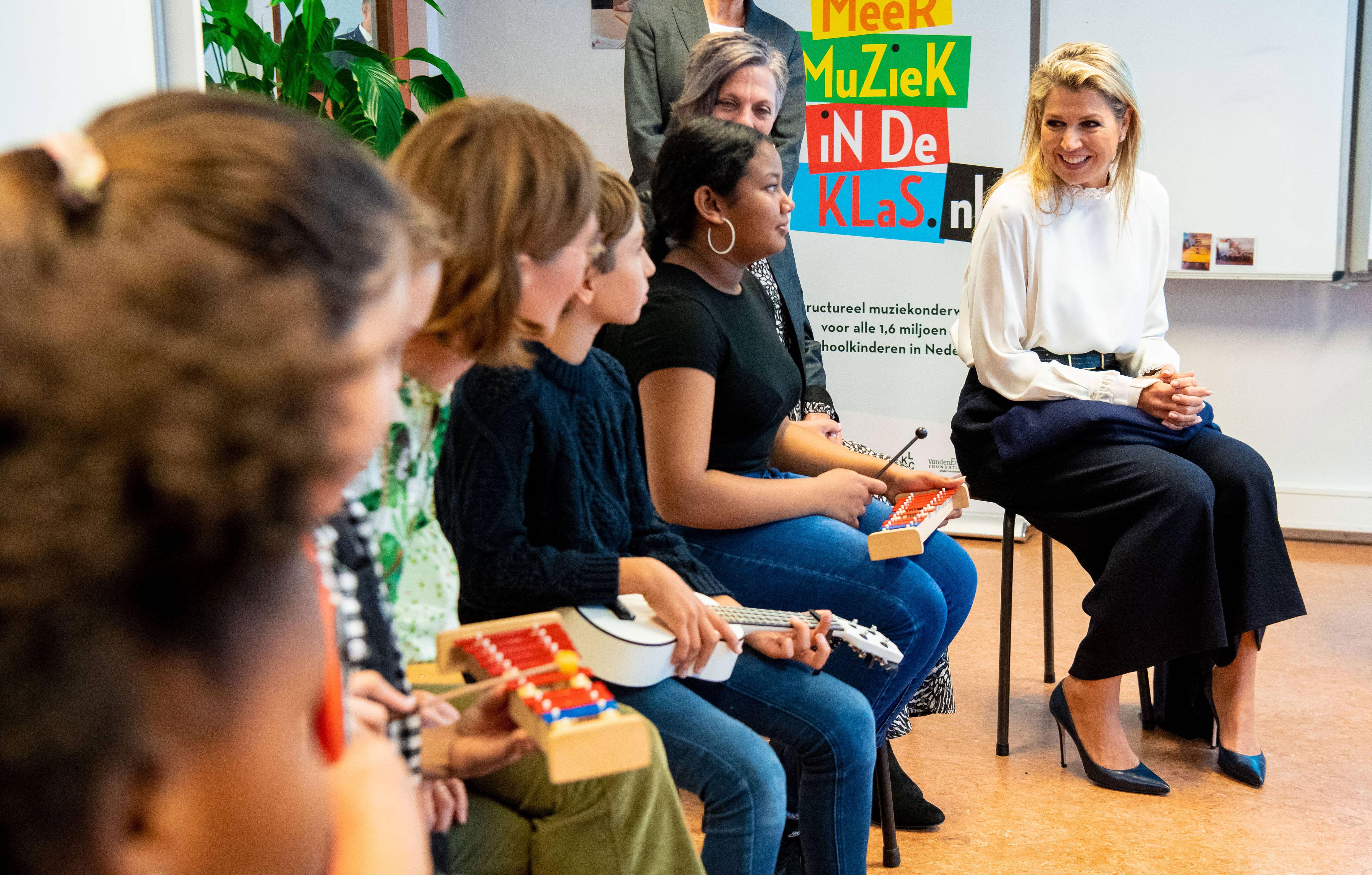 queen maxima visits queen beatrix school in netherlands