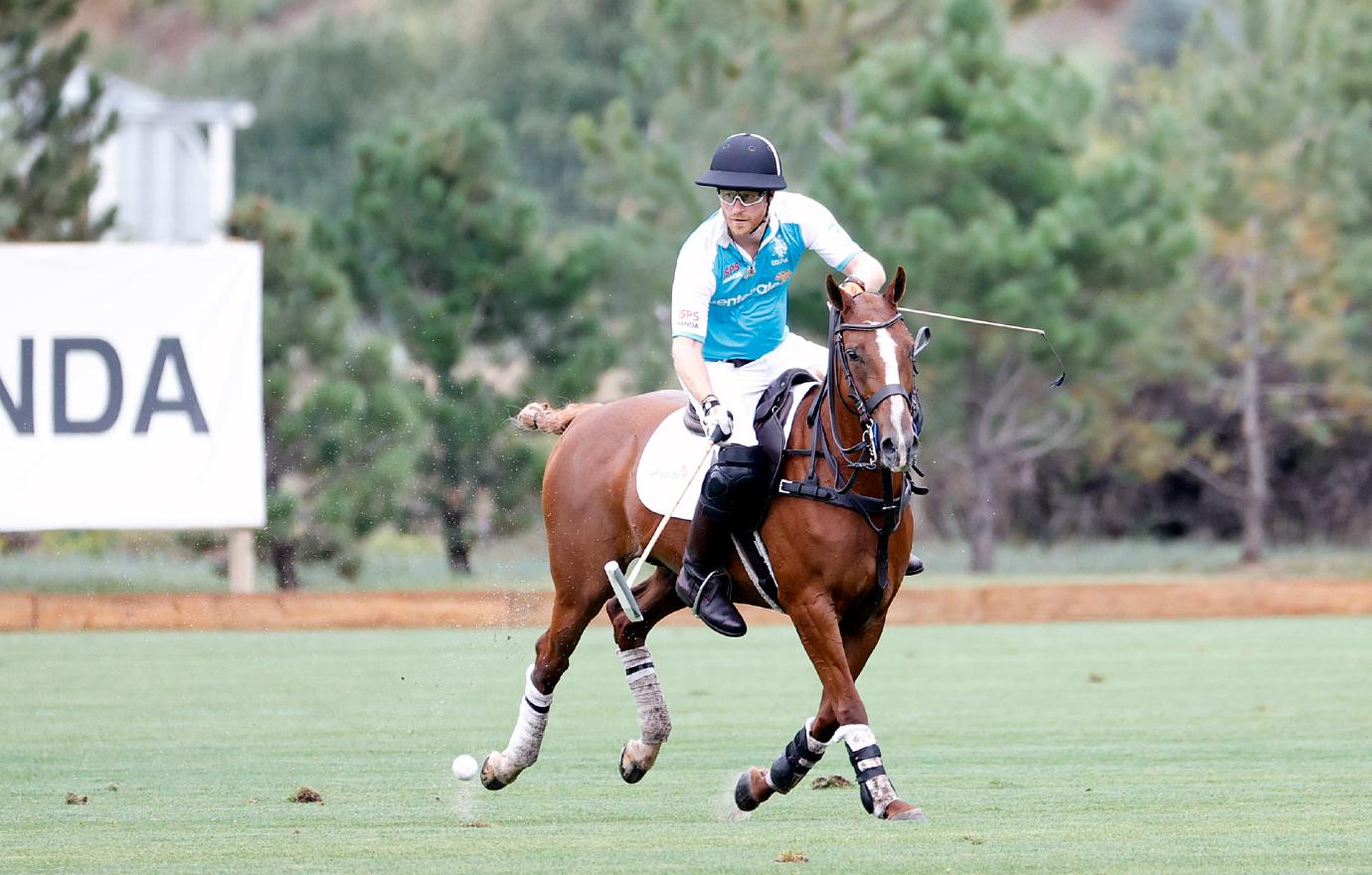 prince harry pleased to be back with the boys at polo match