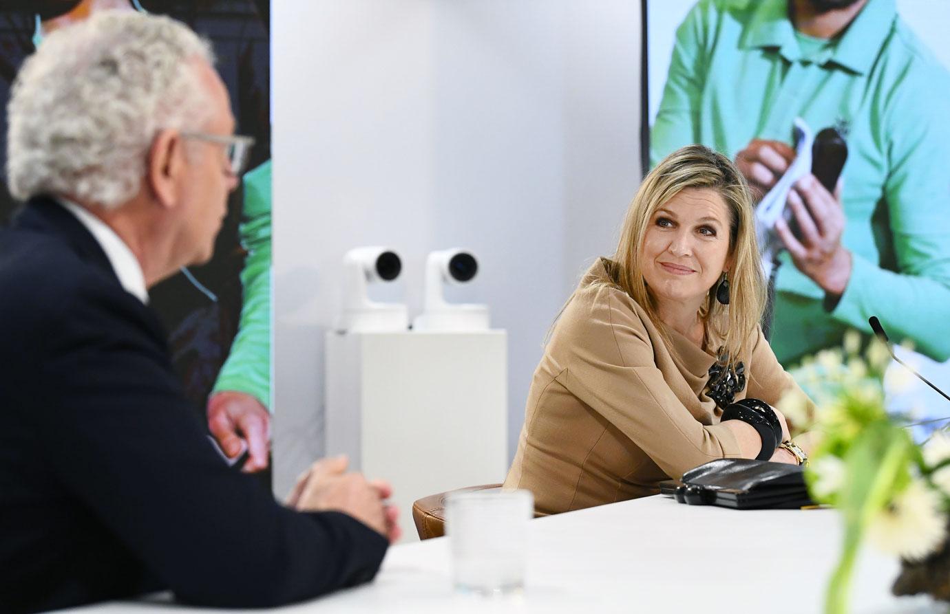 queen maxima of the netherlands visits a cleaning company