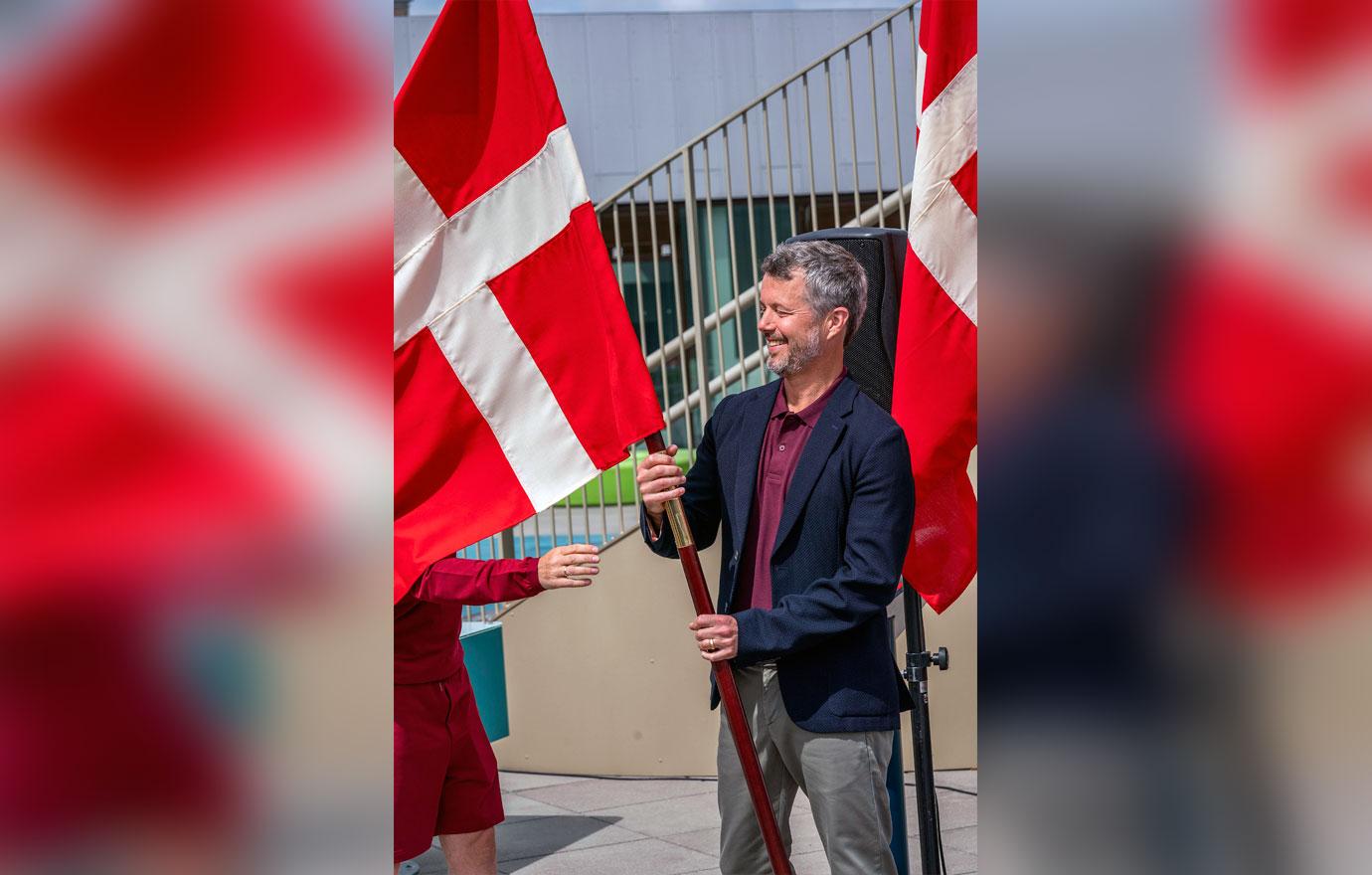 crown prince frederik of denmark hands out danish olympic flag